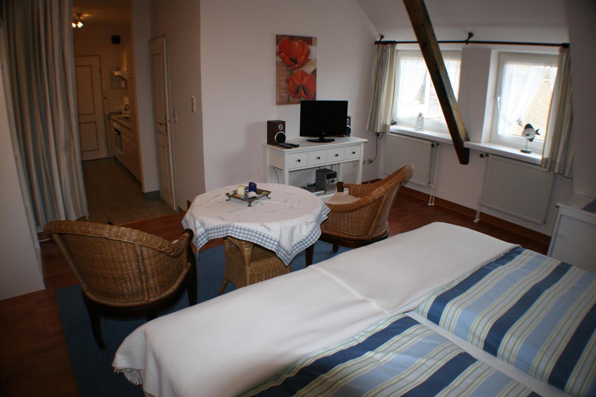 Ferienwohnungen Im Hotel Garni Zur Post Utersum Pokoj fotografie